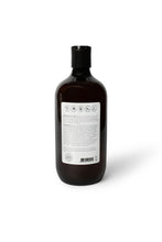 Load image into Gallery viewer, Bottle of dog shampoo with natural ingredients, sulphate and paraben free with spiced cucumber, lavender and tea-tree scent