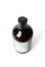 Load image into Gallery viewer, Top view of a bottle of dog shampoo with natural ingredients, sulphate and paraben free with spiced cucumber, lavender and tea-tree scent