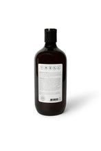 Load image into Gallery viewer, Bottle of dog shampoo with natural ingredients, sulphate and paraben free with spiced cucumber, lavender and tea-tree scent
