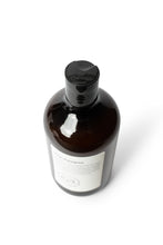 Load image into Gallery viewer, Top view of a bottle of dog shampoo with natural ingredients, sulphate and paraben free with spiced cucumber, lavender and tea-tree scent
