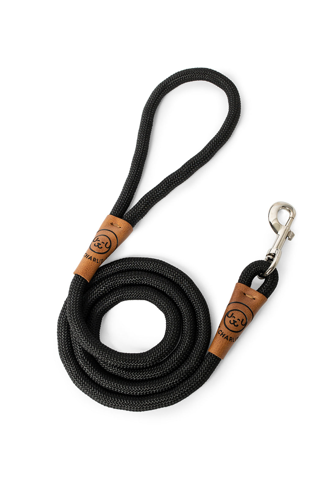 Dog leash in black rope with metal clip and leather features